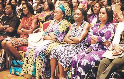  ?? ?? Cross section of women during a conference.