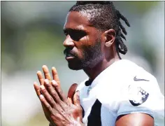  ?? Bay Area New Group/tns ?? Oakland Raiders’ Antonio Brown stretches during a minicamp practice at the team’s facility in Alameda on June 11.