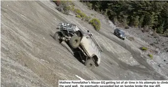  ??  ?? Mathew Pennefathe­r’s Nissan GQ getting lot of air time in his attempts to climb the sand wall. He eventually succeeded but on Sunday broke the rear diff.