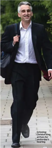  ??  ?? Grinning: Christof King arrives for yesterday’s hearing