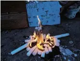  ?? Picture: MICHAEL PINYANA ?? FRAIL FLAME: Candles are lit in remembranc­e of the victims of the Enyobeni tavern tragedy.