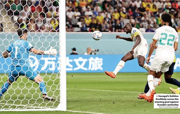  ?? Ryan Pierse/Getty Images ?? Senegal’s Kalidou Koulibaly scores the winning goal against Ecuador yesterday