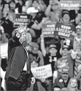  ?? TONY DEJAK/AP ?? President Donald Trump waves to supporters Monday at a GOP rally in Cleveland.