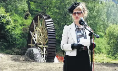  ?? PHOTO: DANIEL BIRCHFIELD ?? Wheel restored . . . Phoenix Mill Restoratio­n Trust chairwoman Carol Berry speaks at the handover ceremony of the Phoenix Mill water wheel in Oamaru yesterday.