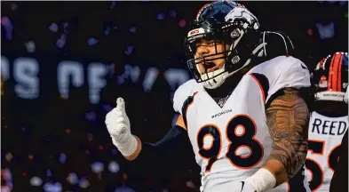  ?? BOBBY ELLIS / GETTY ?? Mike Purcell reacts after making a tackle during Denver’s game against the Indianapol­is Colts at Lucas Oil Stadium in October 2019.