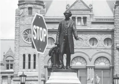  ?? JACK BOLAND ?? Canadians deserve a balanced view of Sir John A. Macdonald, whose statue is in front of the Ontario legislatur­e.