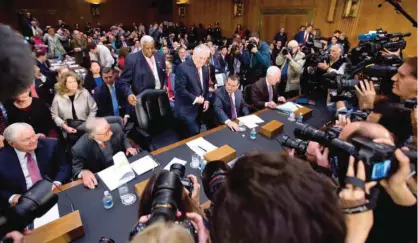  ??  ?? WASHINGTON: Secretary of State-designate Rex Tillerson, center, accompanie­d by, from left, former Defense Secretary Robert Gates, former Georgia Sen San Nunn, Sen Ted Cruz, R-Texas, and Senate Majority Whip John Cornyn of Texas, takes his seat on...