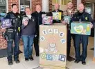  ?? Contribute­d photo ?? Pictured near the Bare Necessitie­s Law Enforcemen­t Diaper Drive drop-off box in the Clinton Police Department are, left to right, Officer Kate Recchia, Records Clerk Pam Ferrier, Chief Vincent DiMaio, Capt. Scott Jakober, Cpl. John Harkins and Capt. James DePietro.