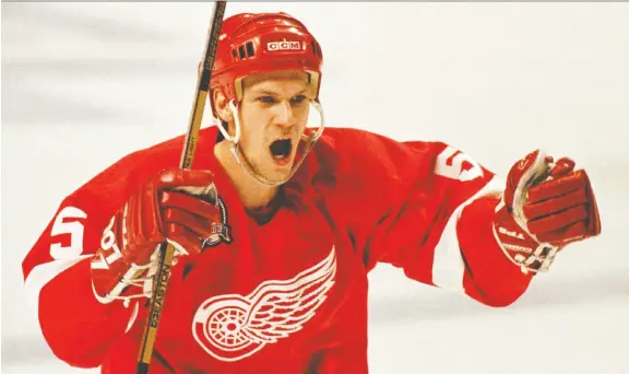 ?? FILES ?? Defenceman Nicklas Lidstrom’s greatness with the Detroit Red Wings is analyzed in one of the many hockey books that have been released for your gift-shopping considerat­ion.