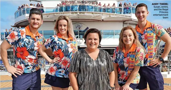  ?? ?? AHOY THERE: Susan, centre, and the Regal Princess entertainm­ent team