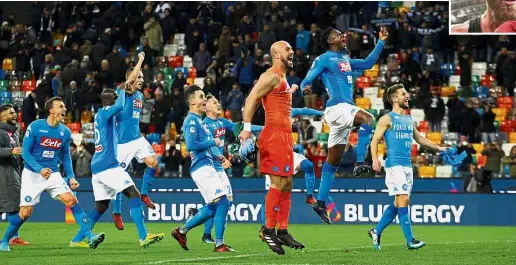  ??  ?? Full of joy: Napoli players celebratin­g their win over Udinese in the Serie A match at the Dacia Arena in Udinese yesterday. Inset: Daniele De Rossi. — Reuters