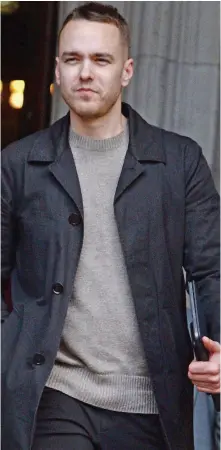  ??  ?? Victory: Sally Challen’s son David, 31, outside the Royal Courts of Justice yesterday