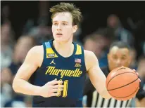  ?? AP ?? Marquette coach Shaka Smart says star guard Tyler Kolek, above, has been practicing in 5-on-5 drills this week as the 2023 Big East player of the year gets ready to return from an oblique injury.
Charges keep Illinois star silent: