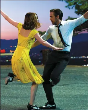  ??  ?? Ryan Gosling as Sebastian Wilder and Emma Stone as Mia Dolan in LaLaLand.