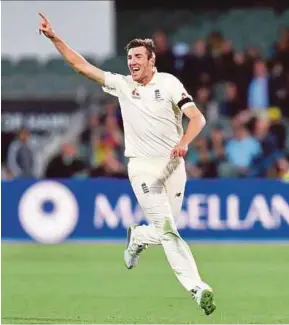  ?? EPA PIC ?? Craig Overton of England celebrates the dismissal of Australia captain Steven Smith yesterday.