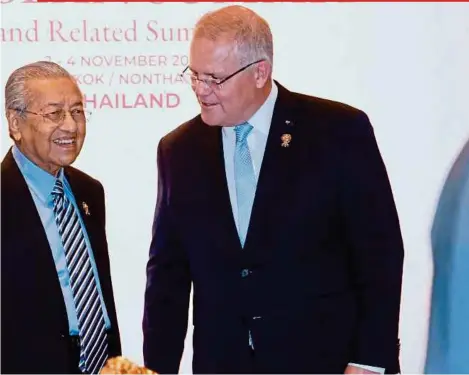  ?? BERNAMA PIC ?? Prime Minister Tun Dr Mahathir Mohamad and his Australian counterpar­t, Scott Morrison, at the 35th Asean Summit and Related Summits in Bangkok yesterday.