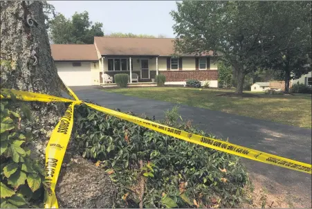  ?? EVAN BRANDT — MEDIANEWS GROUP ?? Police tape closed off the scene of a fatal shooting at this home in the 2900 block of Reifsnyder Road in New Hanover Tuesday.