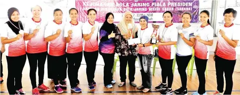  ??  ?? Members of the CTG Keningau team were all smiles with their champions prizes at the President’s Cup Net Ball Tournament 2018 at the Tun Adnan Sports Complex Yayasan Sabah, Sunday.