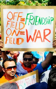  ?? — AFP file photo ?? An Indian cricket fan holds up a placard before the start of the Cricket World Cup semi-final match between India and Pakistan outside The Punjab Cricket Associaton (PCA) Stadium in Mohali.