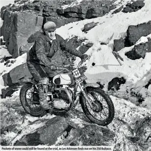  ??  ?? Pockets of snow could still be found at the trial, as Les Atkinson finds out on his 250 Bultaco.