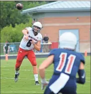  ?? Michelle Petteys, Heritage Snapshots ?? Quarterbac­k Nick Hanson fires toward receiver Dylan Bryan during the Heritage Navy-and-Red scrimmage last Tuesday. The Generals open the season at home on Friday against LFO.