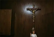  ?? Andrew Rush/ Post- Gazette ?? A crucifix and an Infant Of Prague statue in the sacristy at St. Vitus Catholic Church in New Castle on Feb. 7, 2017.