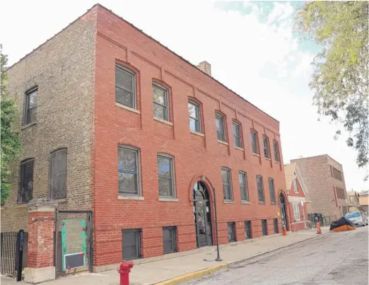  ?? KEVIN TANAKA/FOR THE SUN TIMES ?? Benton House, in the 3000 block of South Gratten, has sold a nearby lot that a developer bought for $100,000 in May, a month after the Chicago City Council rezoned the property to allow constructi­on of a home.