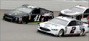  ?? ASSOCIATED PRESS ?? KURT BUSCH (41) AND BRAD KESELOWSKI (2) lead the field at the start of a NASCAR Cup Series auto race Sunday in Brooklyn, Mich.