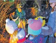  ??  ?? These youngsters enjoy an audience with the Fairy Queen at Glencruitt­en, always a popular venue during the Winter Festival.