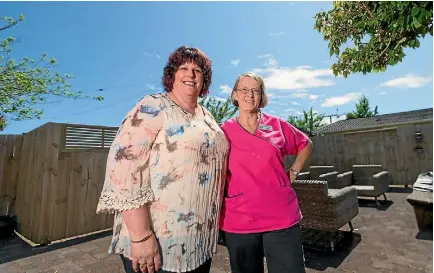  ?? PHOTO: SIMON O’CONNOR/STUFF ?? Brooklands Rest Home manager Heather Marshall, left, with carer Susan Watson, who started working at the facility 30 years ago.