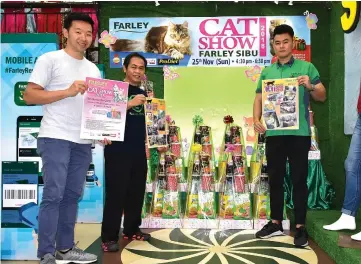  ??  ?? Lau (left) and other members of the organising committee promote the upcoming ‘Farley Cat Show 2018’.