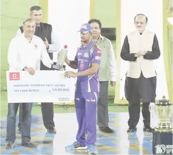  ?? Faheem Hussain - IPL – Sportzpics) (Photo by ?? Lendl Simmons of the Mumbai Indians collecting the cheque on behalf of Sunil Narine of the Kolkata Knight Riders from Sunil Sood from Vodafone India during the final of the Vivo 2017 Indian Premier League between the Rising Pune Supergiant and the...