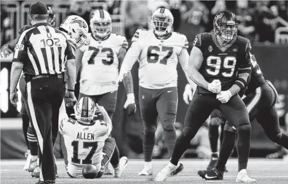  ?? Godofredo A. Vásquez / Staff photograph­er ?? Texans defensive end J.J. Watt celebrates a sack of Bills quarterbac­k Josh Allen (17) during the third quarter Saturday at NRG Stadium.