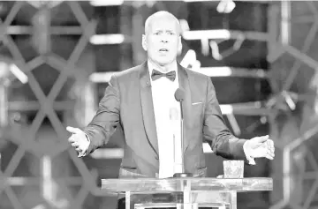  ??  ?? Bruce Willis speaks onstage during the Comedy Central Roast of Bruce Willis at Hollywood Palladium on July 14 in Los Angeles, California.