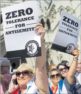  ?? Picture: GETTY ?? UP IN ARMS: Demonstrat­ors campaign against anti-Semitism