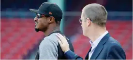  ??  ?? BOSTON: Boston Red Sox President Sam Kennedy, right, talks with Baltimore Orioles’ Adam Jones before a baseball game, Tuesday, May 2, 2017. — AP