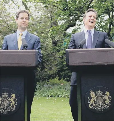  ??  ?? David Cameron, right, and Nick Clegg at their first joint press conference as they formed a coalition Government in 2010.