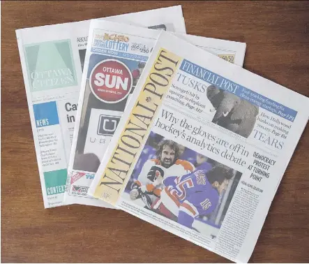  ?? JUSTIN TANG /THE CANADIAN PRESS/FILES ?? Postmedia Network Canada Corp. announced steep declines in revenue and print advertisin­g Thursday. The company now is looking to reduce staffing costs by 20 per cent.