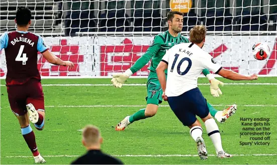  ??  ?? Harry ending: Kane gets his name on the scoresheet to round off Spurs’ victory