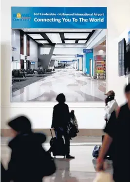  ?? CARLINE JEAN/STAFF PHOTOGRAPH­ER ?? The $129 million connectors are part of an ongoing $3.2 billion expansion and developmen­t program at the airport.