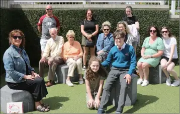  ??  ?? Darragh Jordan, celebratin­g his historic graduation from St St Aidan’s Parish School with his mum Anita, grandparen­ts Paddy and Ann Buckley, and family members.