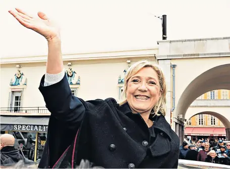  ??  ?? Marine Le Pen campaignin­g in Nice earlier this week. The taboo of voting for the Front National is not what it was, and polls show the gap with François Fillon closing