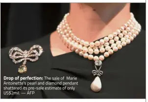  ??  ?? Drop of perfection: The sale of Marie Antoinette’s pearl and diamond pendant shattered its pre-sale estimate of only US$2mil. — AFP