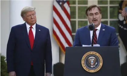  ?? Photograph: Alex Brandon/AP ?? Mike Lindell and Donald Trump in the White House Rose Garden in March 2020.