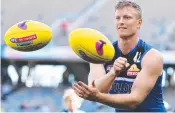  ?? ?? Bulldog Alex Keath during the club’s captains run at Optus Stadium on Friday. Picture: Michael Klein