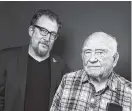  ?? AP FILE PHOTO BY REBECCA CABAGE/INVISION ?? Ed Asner, right and his son, Matt Asner, promoted an internet comic-art auction last week that helped raise funds for The Ed Asner Family Center.