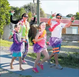  ?? PICTURE / KIRSTY SAXON ?? Enthusiast­ic competitor­s Vinnie (8), Alice, Ariana (10) and Dan Burnett showing good form in the inaugural Te Wairoa Challenge.