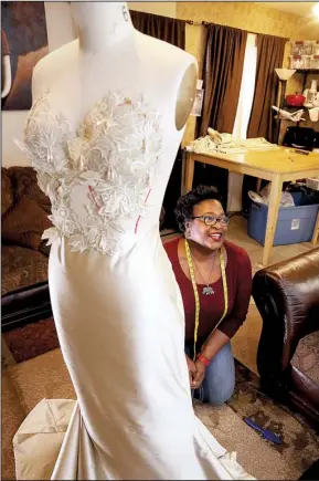  ?? Arkansas Democrat- Gazette/ JOHN SYKES JR. ?? Shonda Ali- Shamaa of Conway prepares her fall 2016 line to be shown during New York Fashion Week, which begins Wednesday. Ali- Shamaa says she’d like to see more Arkansas designers go to New York. “I would like for us to do an Arkansas show,” as she...