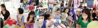  ??  ?? FEEDING. Women and children of Barangay Kamagayan, Cebu City having porridge for breakfast donated by the barangay during the One-Stop Service. Rice, cash and foodstuff were donated by GMA-7, Zontian Nellie Chiu, Zontian Tess Chan, Area 3 director Stella Bernabe, Choobi-Choobi, Anita’s and Zonta Club of Cebu 1. Entertainm­ent was presented by GMA-7 and the University of San Jose-Recoletos.