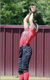  ?? Photograph­s courtesy of Samantha Huffman ?? Senior Lady Blackhawk Ravin Cawthon, No. 10, caught a fly ball Friday, May 14, in the Final Eight State Tournament game.
